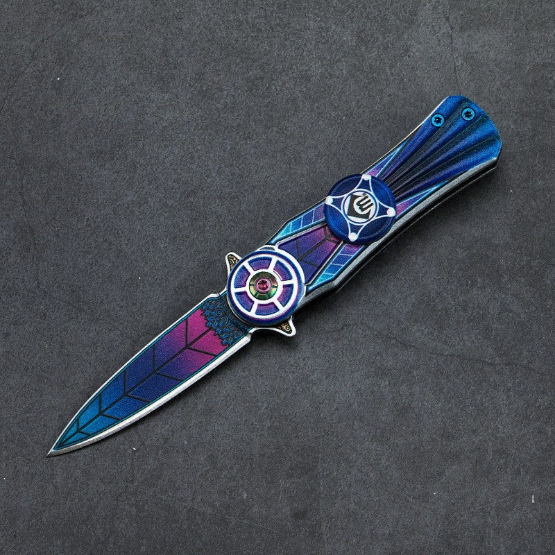 Finger spinner knife